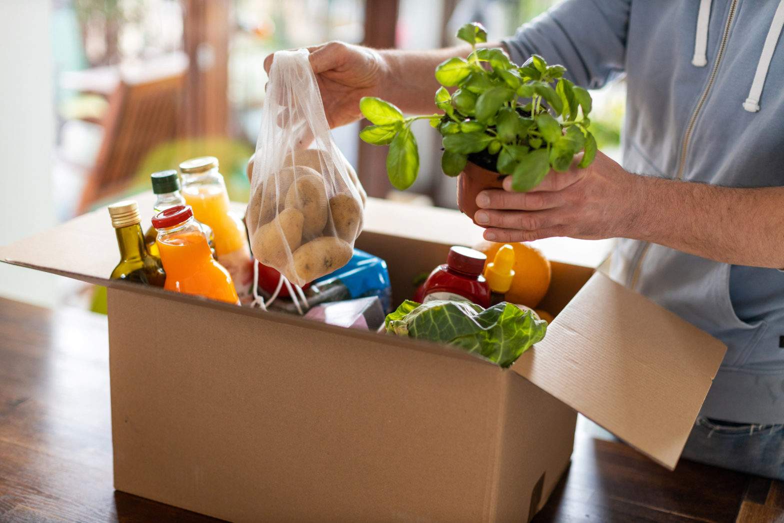 Customer opening their grocery delivery